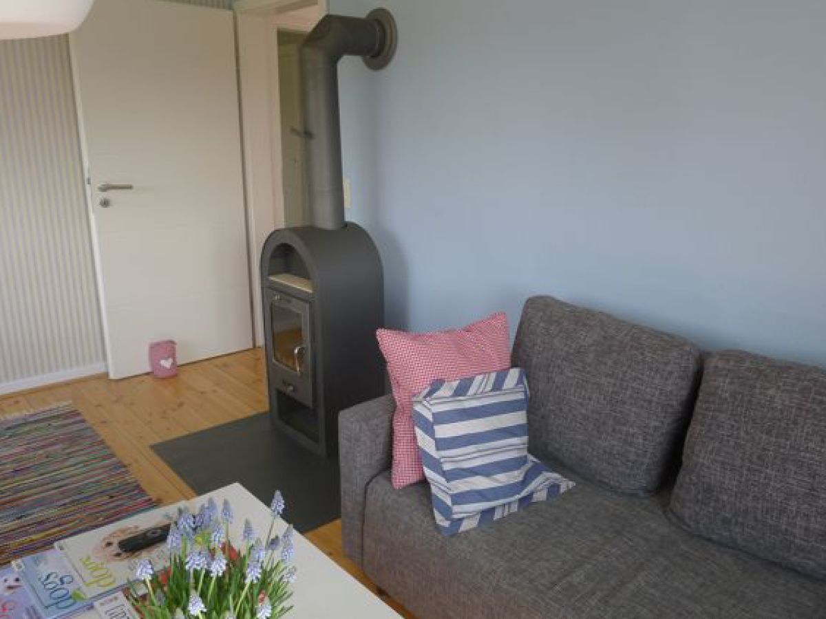 Villa Bootsybunt Blekendorf Wohnzimmer mit Kamin
